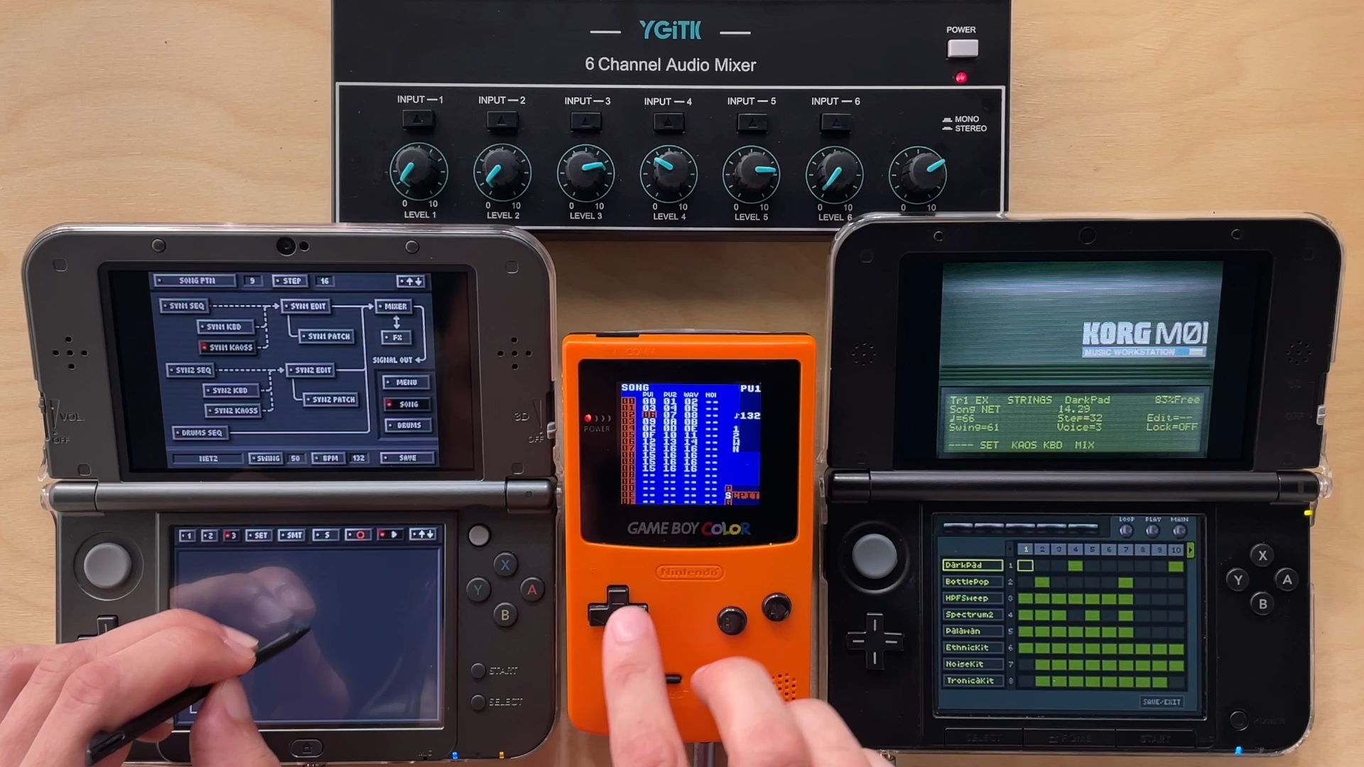 KORG DSN-12 on a New Nintendo 3DS, a Game Boy Color and KORG M01 on a Nintendo 3DS, all connected to a six-channel audio mixer